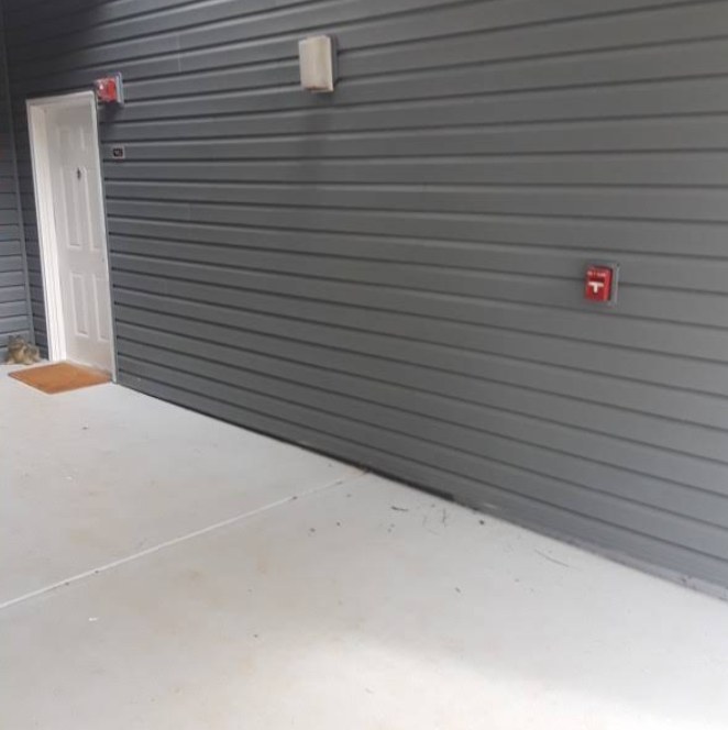 The same walkway completely clear after Up & Out Junk Removal hauled everything away